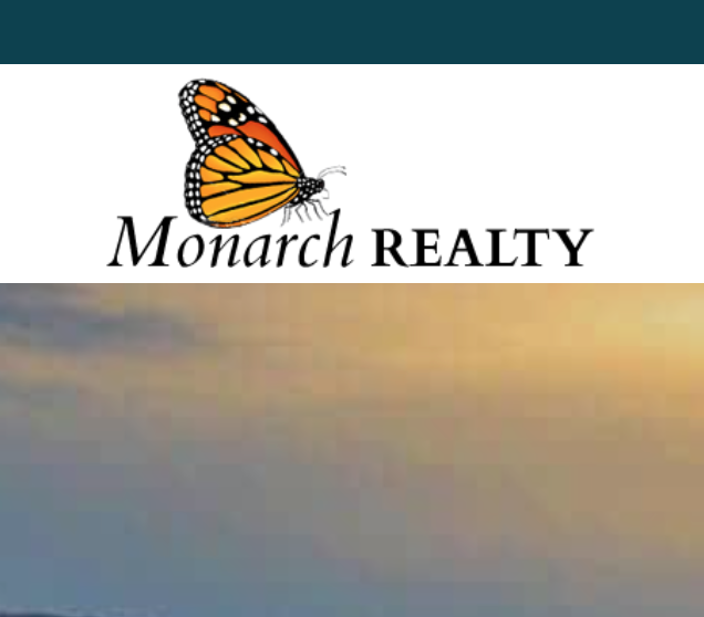 Logo of Monarch Realty, featuring a monarch butterfly above the business name in black text on a white background.